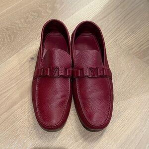 Louis Vuitton dark red moccasin loafers with rubber sole.